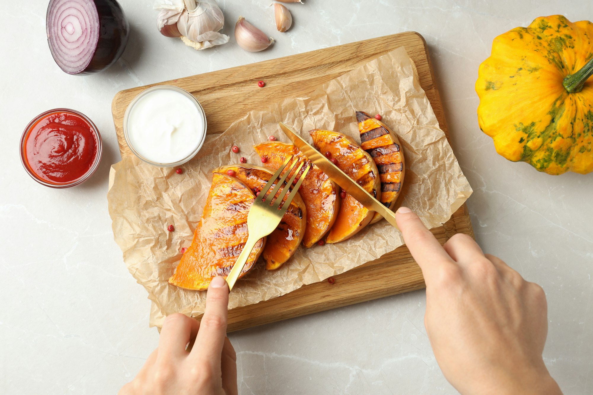 Concept of tasty eating with baked pumpkin