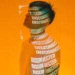 man in yellow and black crew neck shirt